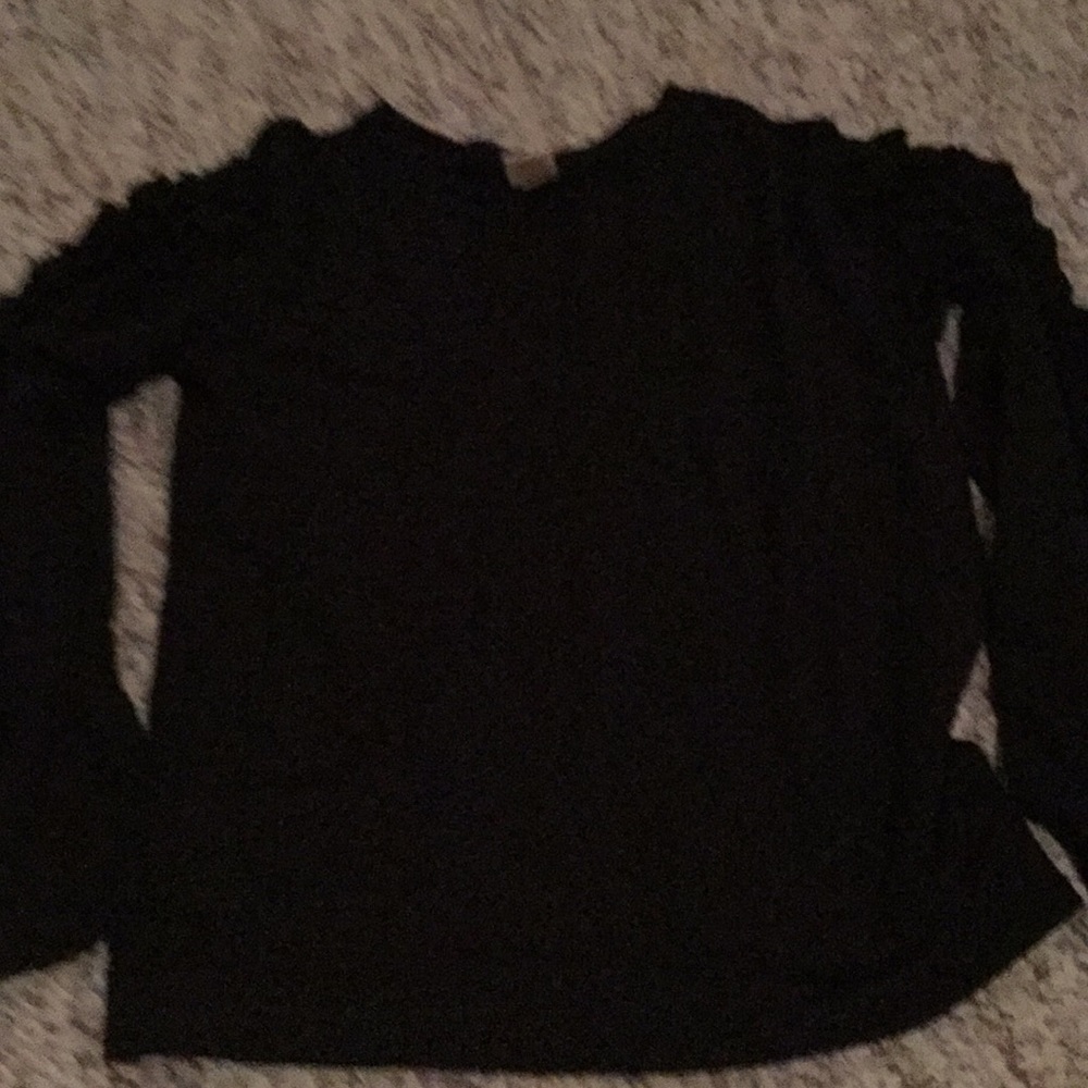 Black long sleeves with ruffles on sleeves